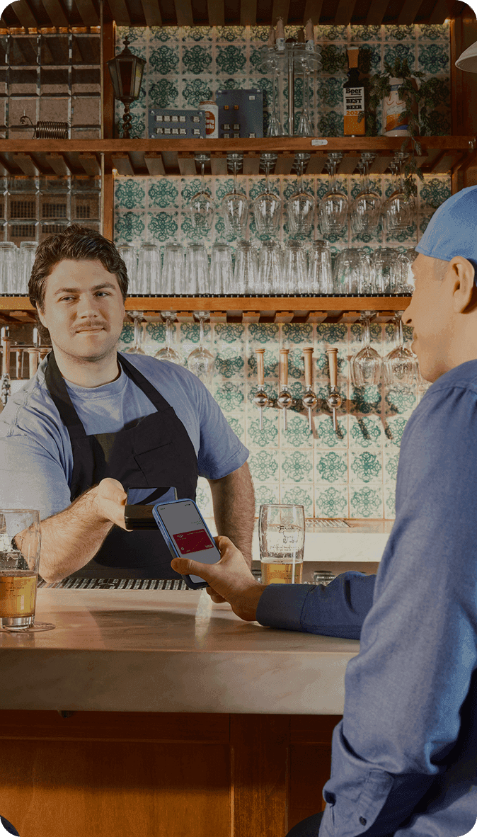 Customers enjoying a drink in a brewery taproom