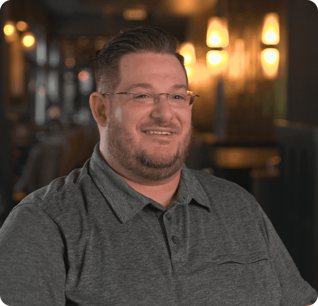 Jonathan Gillespie smiling inside Adalina restaurant