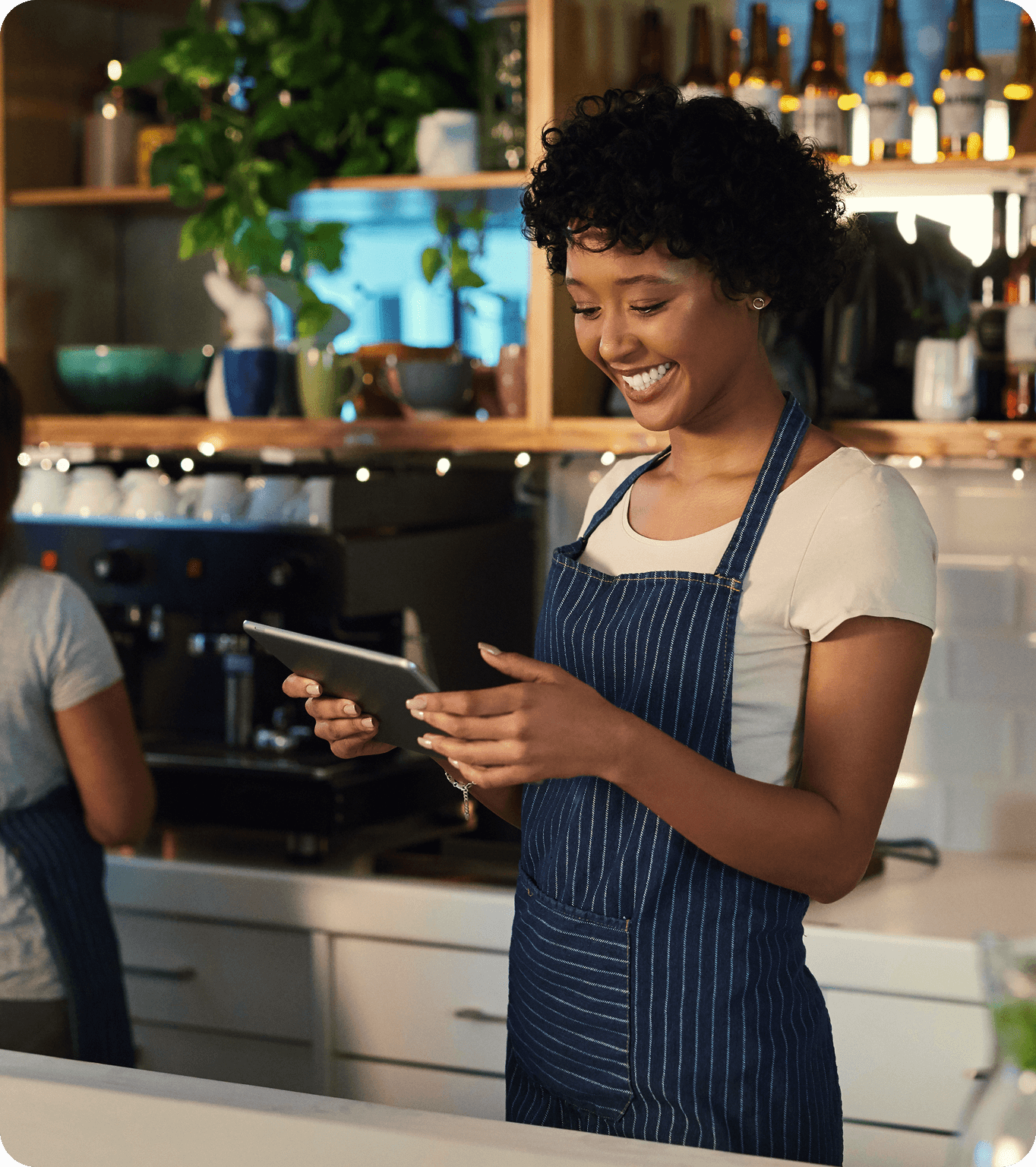 A restaurant manager uses their SpotOn marketing dashboard to update active campaigns.