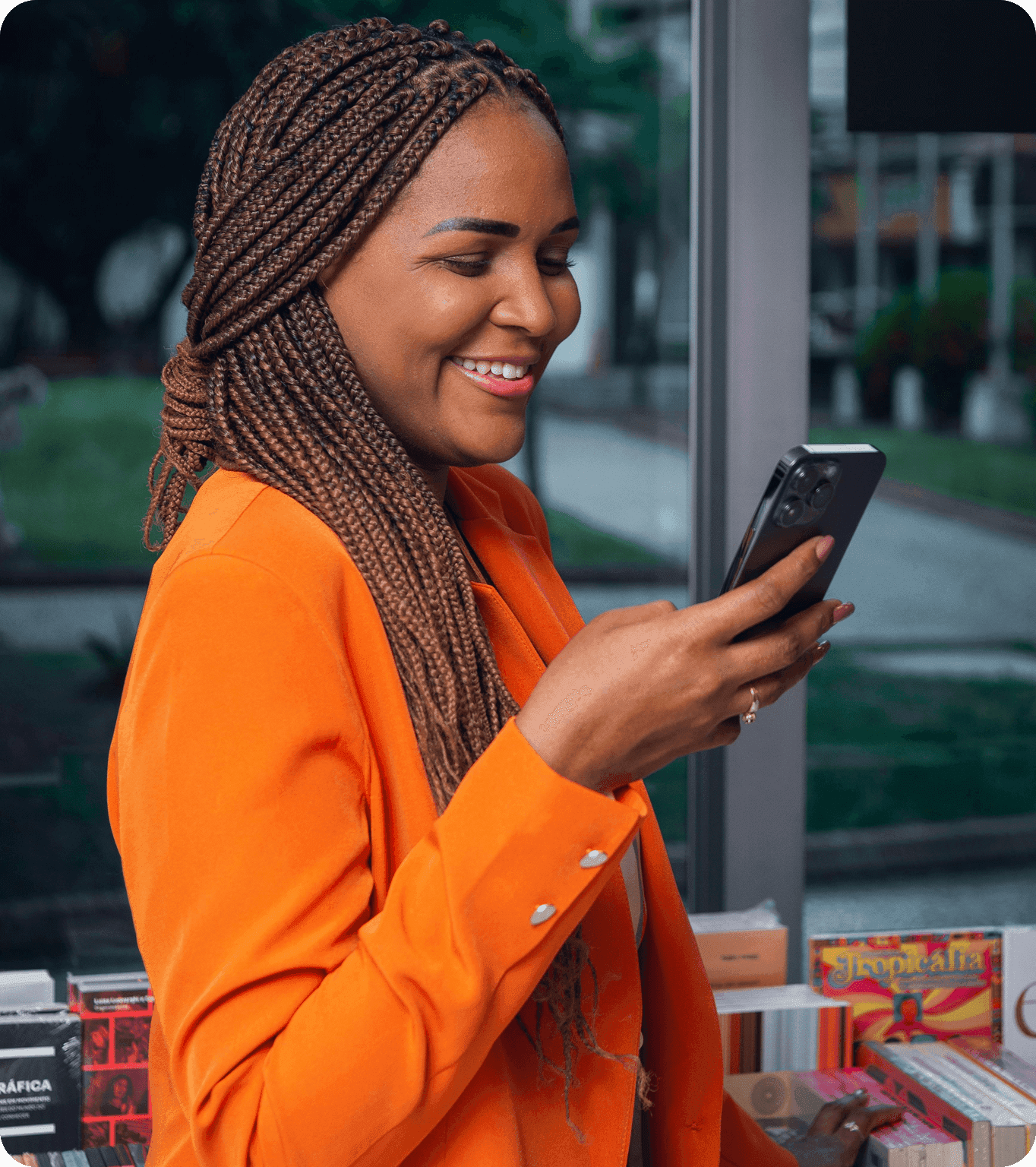 A person checks their mobile phone after receiving an automated reminder about their restaurant reservation
