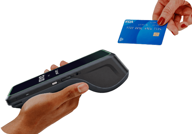 A customer taps to pay with a credit card on a small business POS terminal